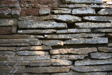 Thin stone wall. background