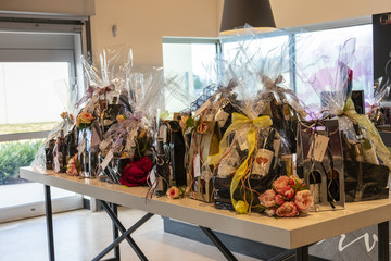 A Table with a Bunch of Beautiful Gift Baskets