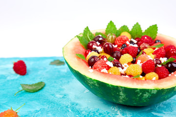 Watermelon bowl with cottage cheese and berries