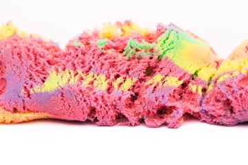 Close-up of a photo of kinetic sand on a white background