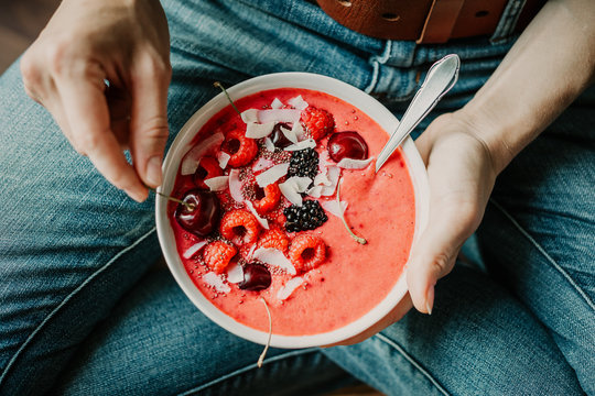 Woman Eating Healthy Smoothie Bowl