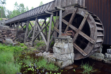 Fototapeta na wymiar Watermill. One of the 2 working in Norway. Degerness,Norway