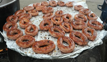 Sausages baked in food foil paper. Festival of Ukrainian national cuisine in the open air, Ivano-Frankivsk, Ukraine