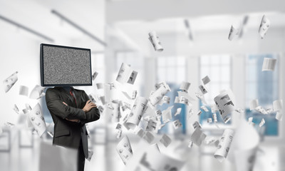 Businessman with TV instead of head.