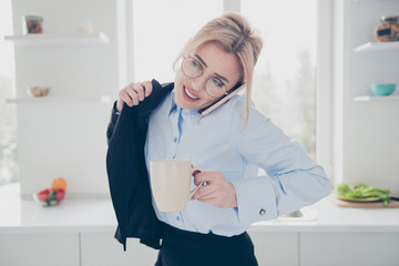 Young attractive adorable smiling blonde woman office executive worker wearing spectacles in hurry...