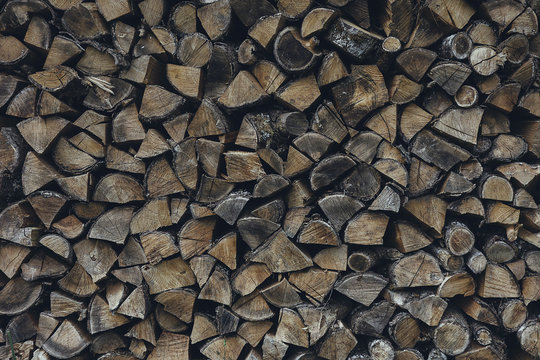 Dried chopped stacked firewood logs