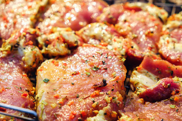 Beef meat steaks. Fresh raw pork neck for steak with herb spices on a barbecue grill