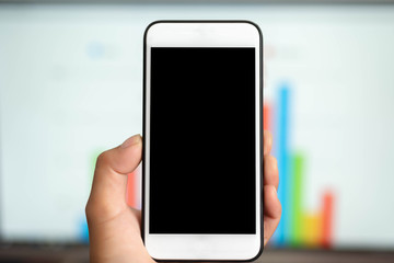 mobile smart phone and business graph background.