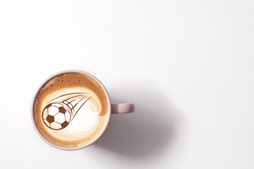 Coffee cappuccino in a cup for breakfast for a football fan