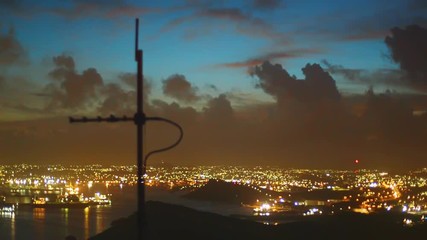 This is cinematic cityscape night panorama with antenna captured in Curacao island, Caribbean region.