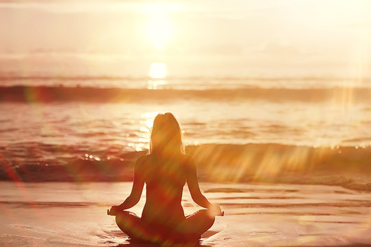 meditation and yoga on the beach / summer vacation concept health beauty, summer vacation yoga classes on the sea shore