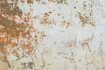 Wall fragment with scratches and cracks