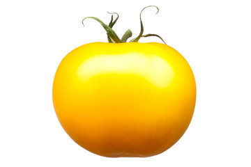 Obraz premium Delicious single yellow tomato isolated on white background with clipping path