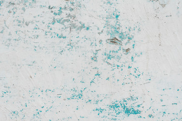 Wall fragment with scratches and cracks