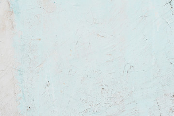 Wall fragment with scratches and cracks