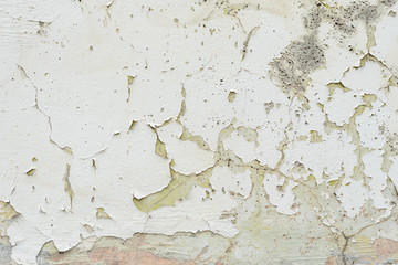 Obraz premium Wall fragment with scratches and cracks