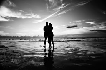 silhouette in love sunset sea / newlyweds in honeymoon at sea, vacation luck summer sea beach,...
