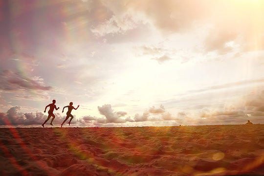 silhouettes of athletes running along the beach / sports summer in the warm sea, healthy rest, sports activity, summer vacation - Powered by Adobe