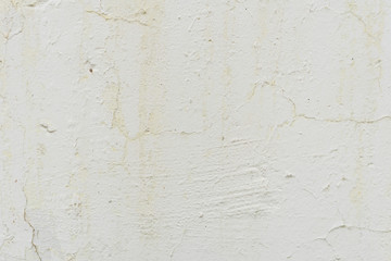 Wall fragment with scratches and cracks