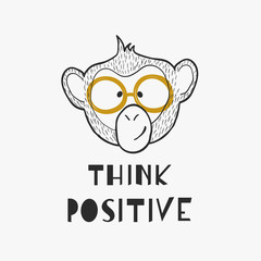 A cute outline monkey head with motivational phrase - Think Positive.