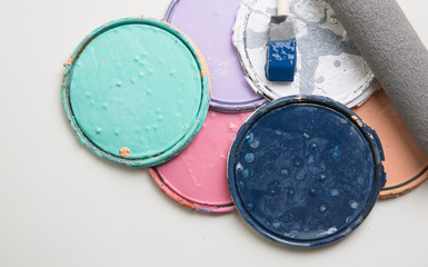 multi color old paint can lids