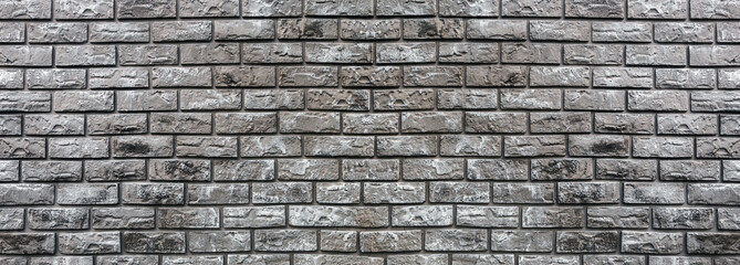 brick wall of decorative gray stone. background