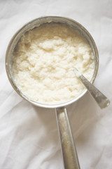 Cream rice pudding in the pot 