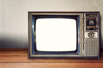 old classic analog television vintage style with empty blank white screen on retro wall background