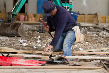 bricklayer at work in a building site