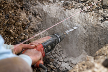bricklayer at work in a building site