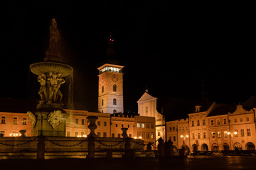 Fototapeta na wymiar Main square of Budweis with fountain and Black Tower at night
