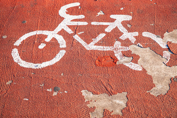 Bicycle lane. Grungy white road marking