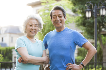 Portrait of senior couple standing outdoors