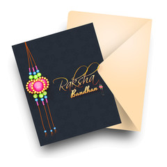 Happy Raksha Bandhan black greeting card design with beautiful rakhi (wristband) and envelope.  