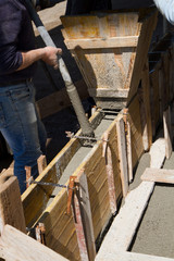 bricklayer at work in a building site