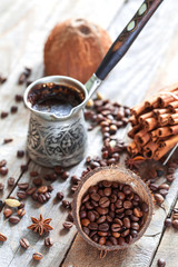 Turkish coffee theme, dark style still life decorated with spices.