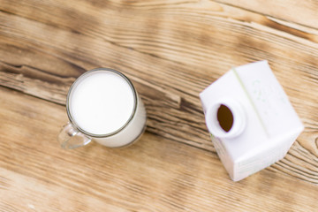 Glass kefir (milk) on a wooden background. The concept of diet, weight loss.