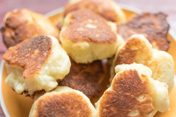 Pancakes stuffed on a plate.