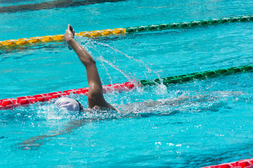 swimmer in lane pool, woman in water