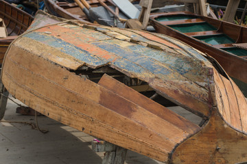 Rowing boat needing repair at Richmond upon Thames