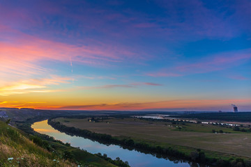 Beautiful nature landscape panorama sunset with dramatic sky and river in valley