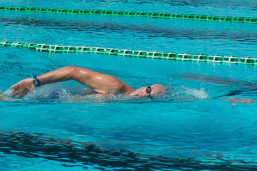 Senior man swimmer - Concept of sport and fun in swimming pool