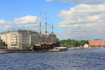 St. Petersburg Cityscape with Neva River Water and Old Historical Wooden Ship in Russia. Saint Petersburg City Landmarks on Summer Day, Colorful Skyline View of Downtown City Location.