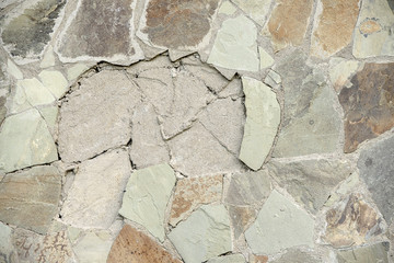 texture of a wall from a natural stone, background