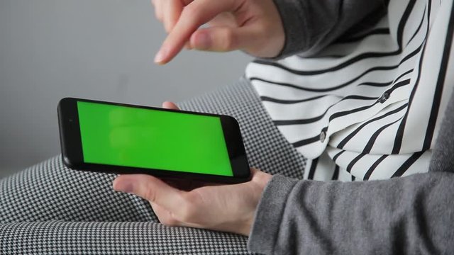 Business woman using a Smart phone Touchscreen CHROMA KEY- Close-up.