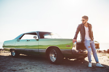 Man with retro car