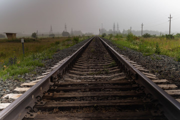 Plakat railway on a cloudy day