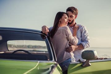 Couple with retro car