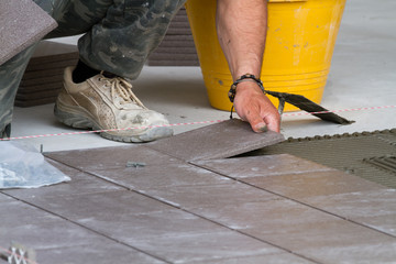 bricklayer at work in building site