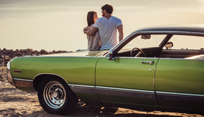 Couple with retro car